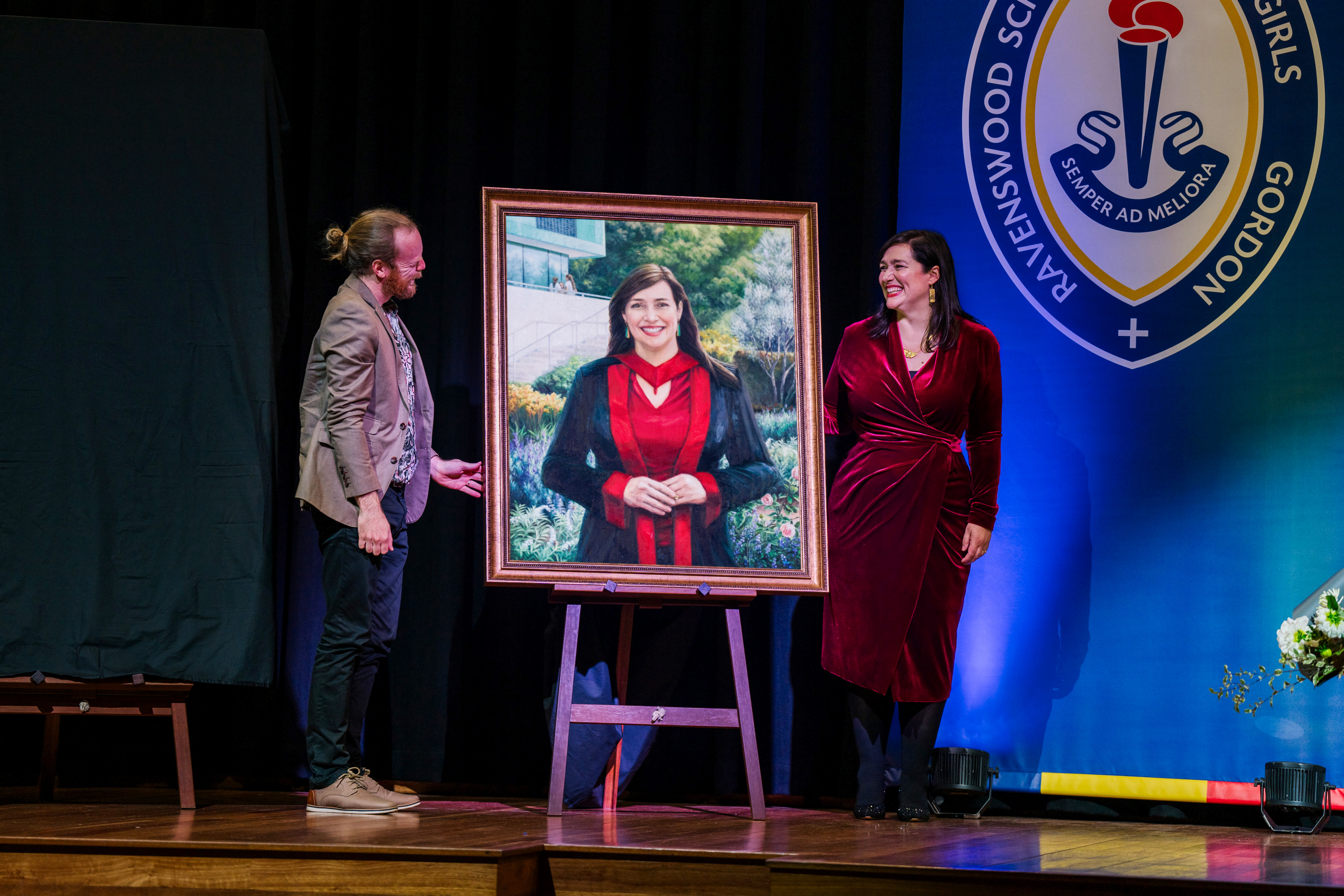 Tim Owers presenting his portrait of Dr. Anne Johnstone at Ravenswood School for Girls